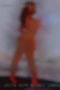 White wife cuddles with a pool in McCall, Idaho.